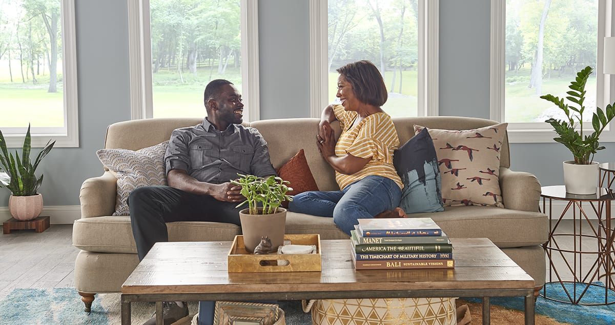 a family relaxes in a home with a ductless mini split air conditioner installed a family relaxes in a home with a ductless mini split air conditioner installed