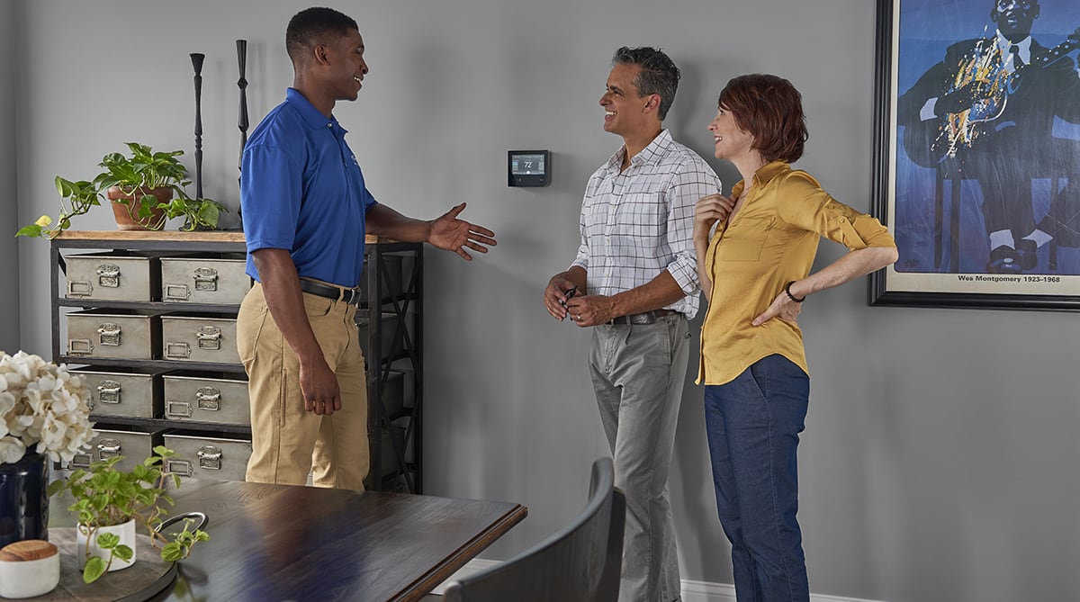 a carrier dealer and homeowner discuss carbon monoxide detector placement a carrier dealer and homeowner discuss carbon monoxide detector placement