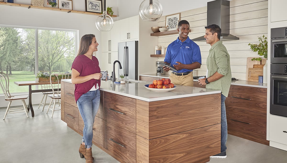 a carrier dealer discusses ac capacitors with homeowners a carrier dealer discusses ac capacitors with homeowners