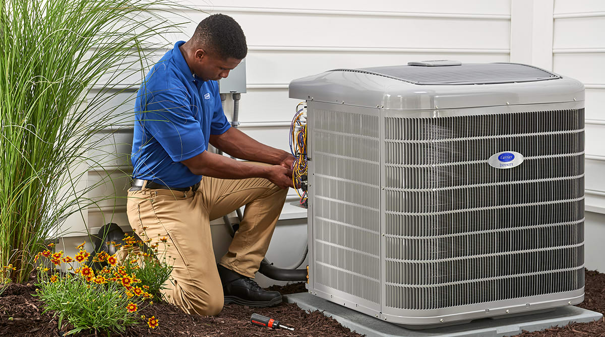 a carrier dealer finishes performing heat pump installation a carrier dealer finishes performing heat pump installation