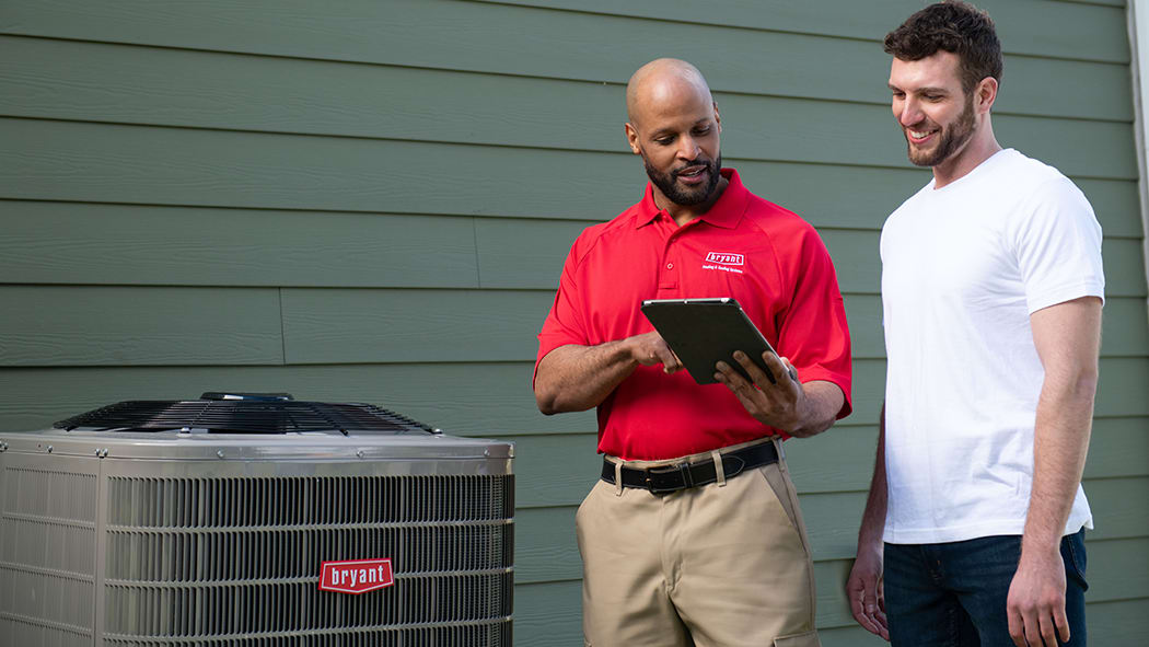 bryant dealer discusses heat pump replacement options with homeowner bryant dealer discusses heat pump replacement options with homeowner