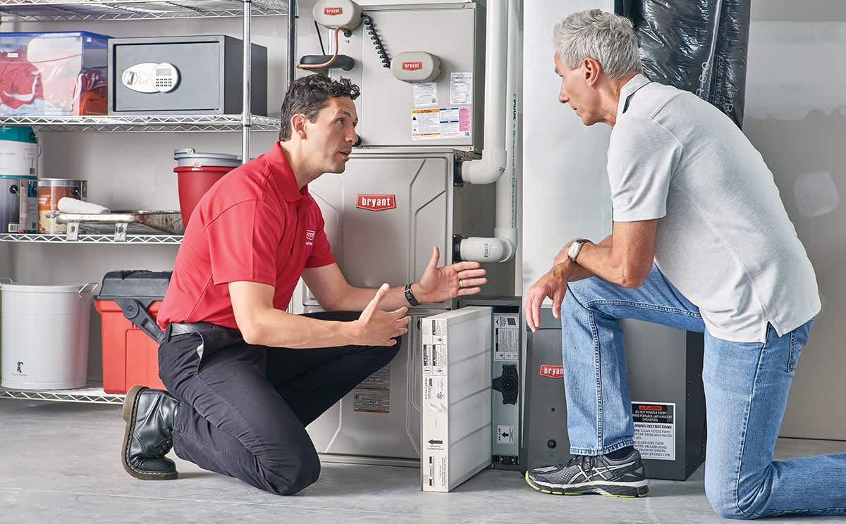 a bryant dealer shows a homeowner reasons for a furnace blowing cold air a bryant dealer shows a homeowner reasons for a furnace blowing cold air