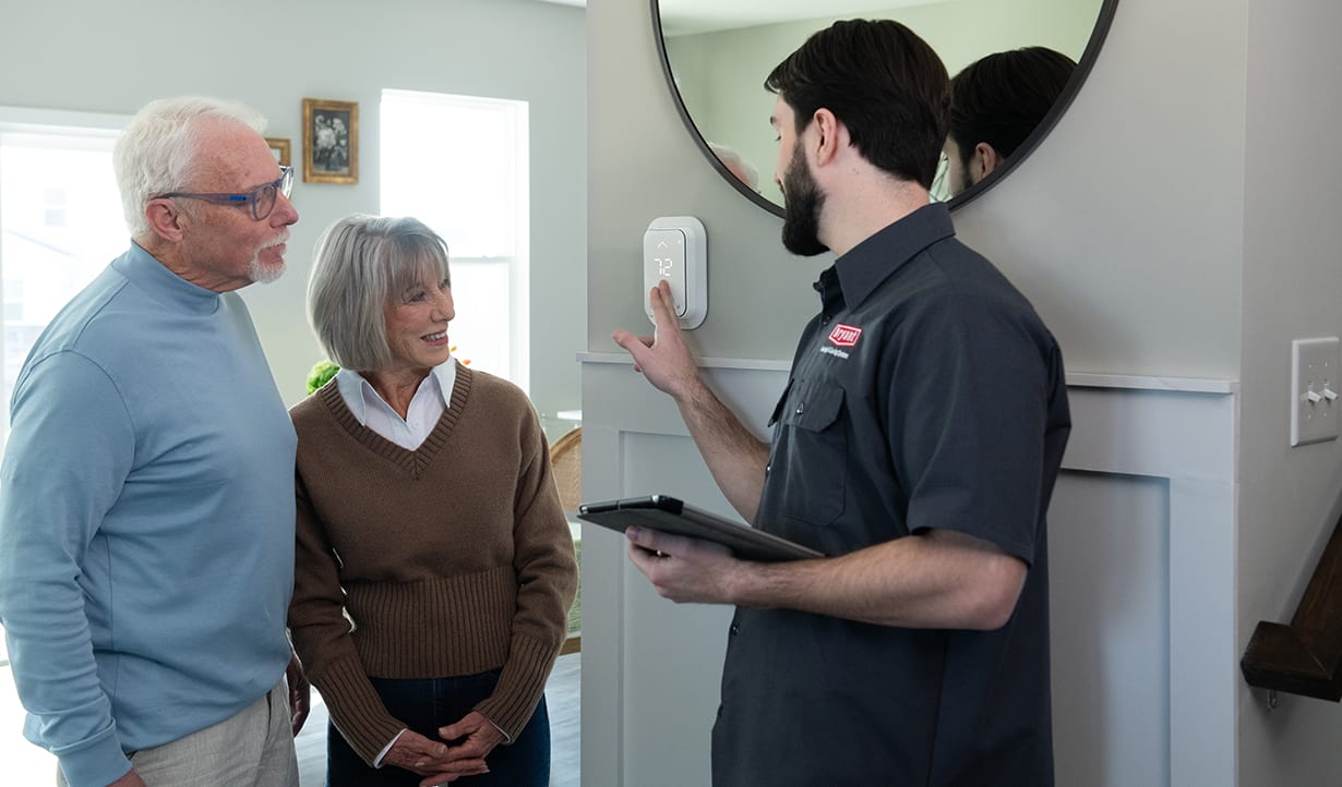 a bryant dealer explains wireless thermostats to homeowner a bryant dealer explains wireless thermostats to homeowner