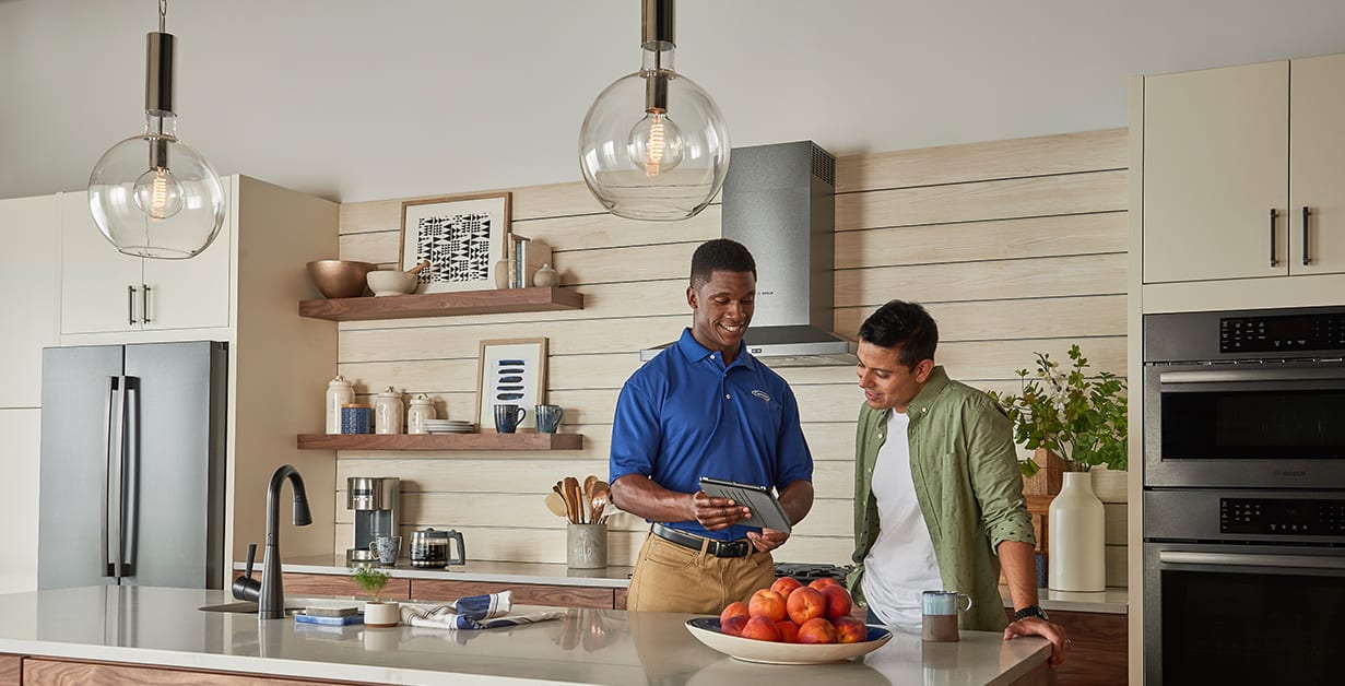 a carrier dealer and homeowner discuss geothermal heat pump installation options a carrier dealer and homeowner discuss geothermal heat pump installation options