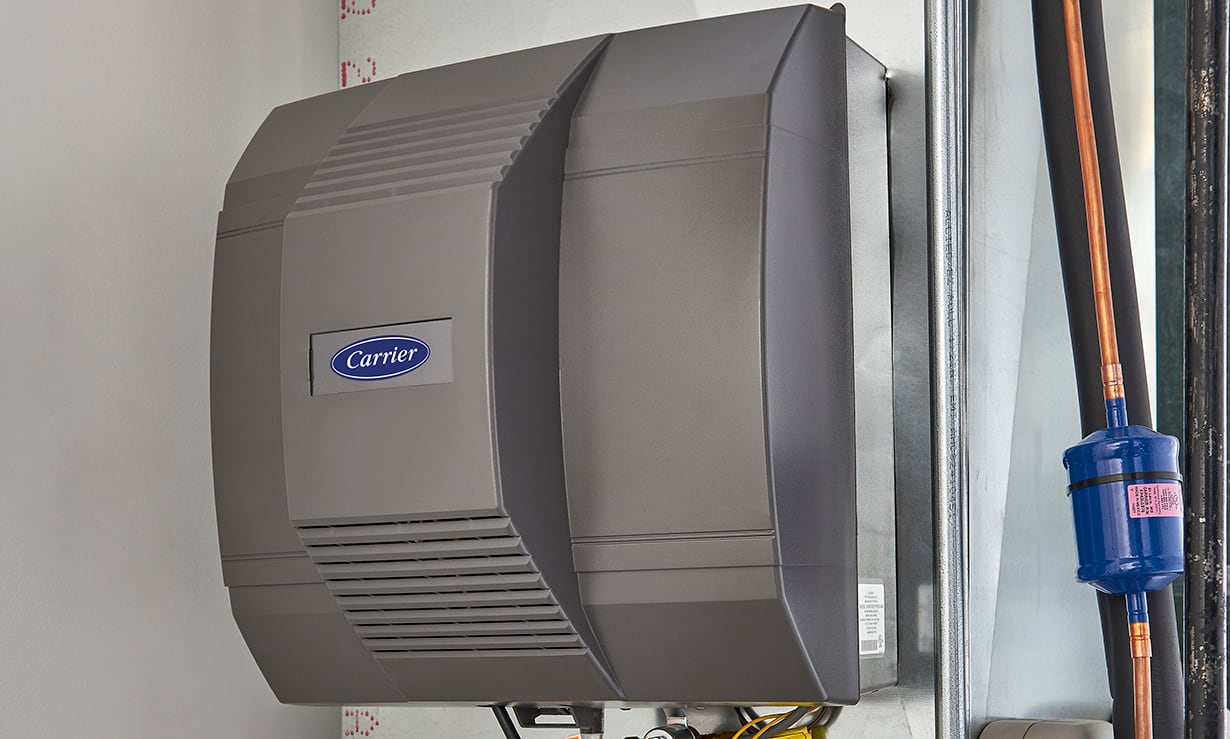 a completed whole house humidifier installation inside of a home a completed whole house humidifier installation inside of a home