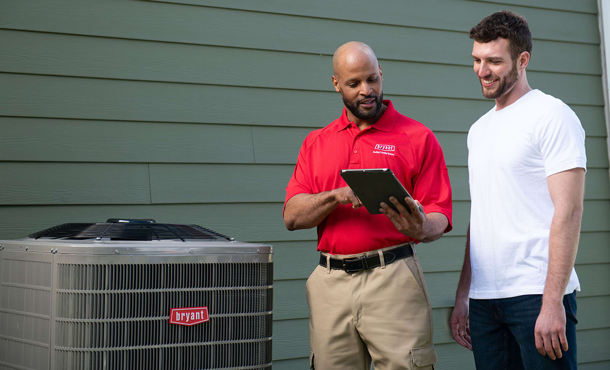 a bryant dealer and homeowner discuss humidifier installation options