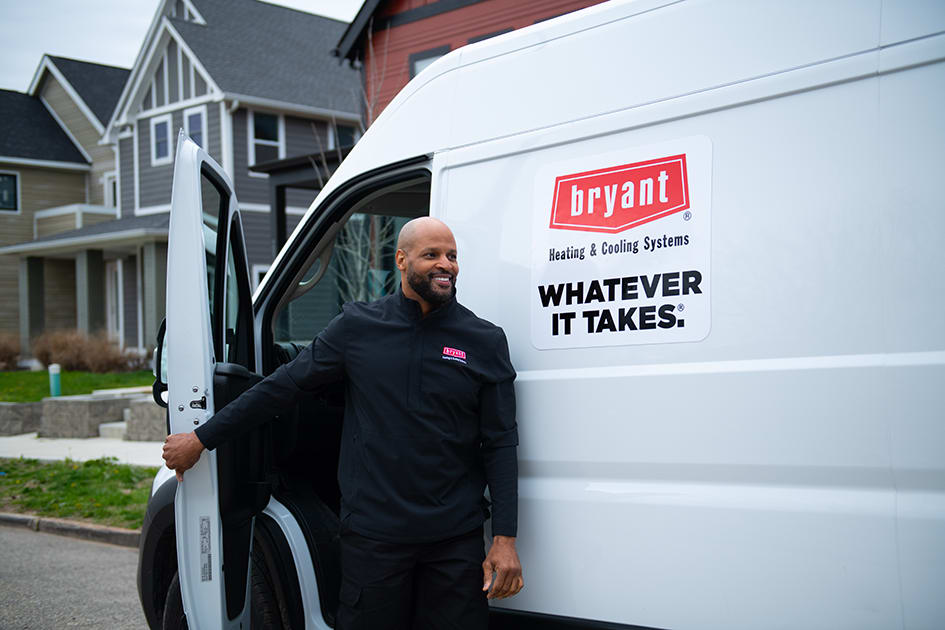 a bryant dealer arrives at a home for air to water heat pump installation