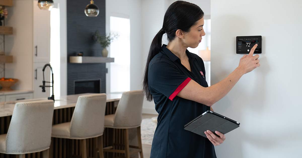 bryant dealer finishes completing thermostat installation