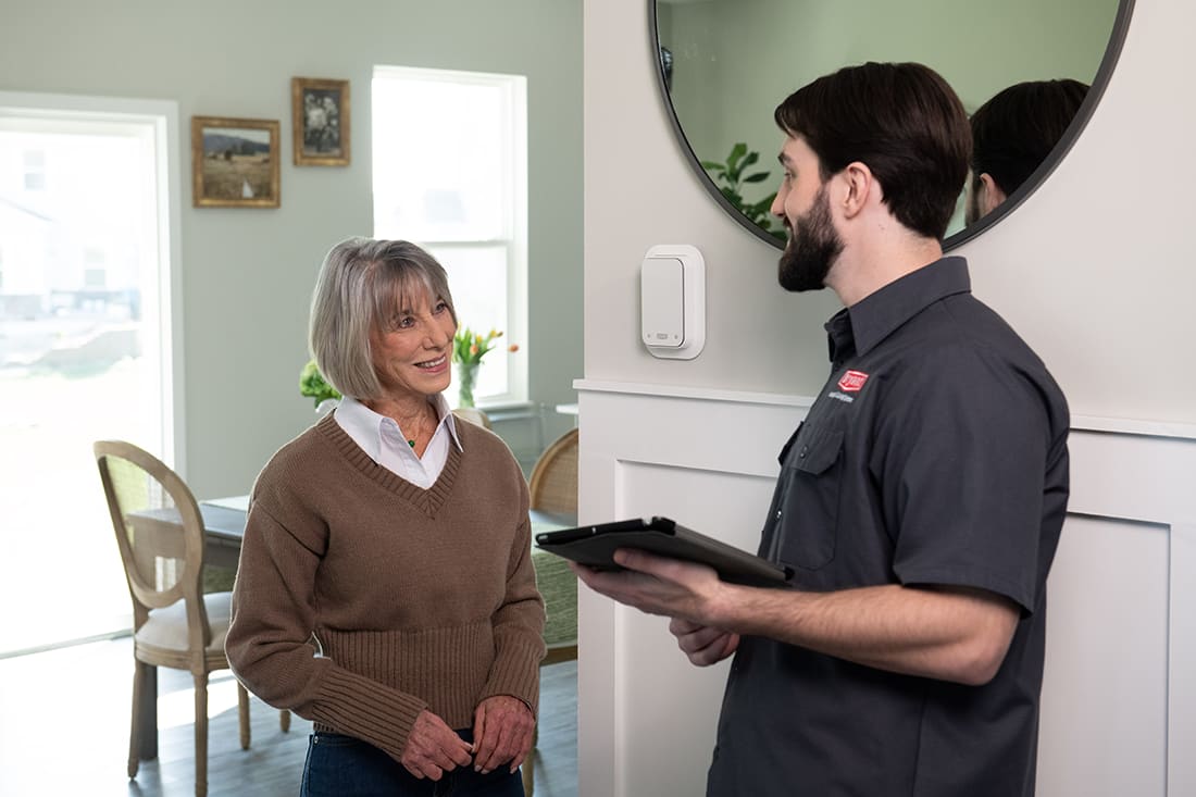 a homeowner discusses hspf2 rating with bryant dealer