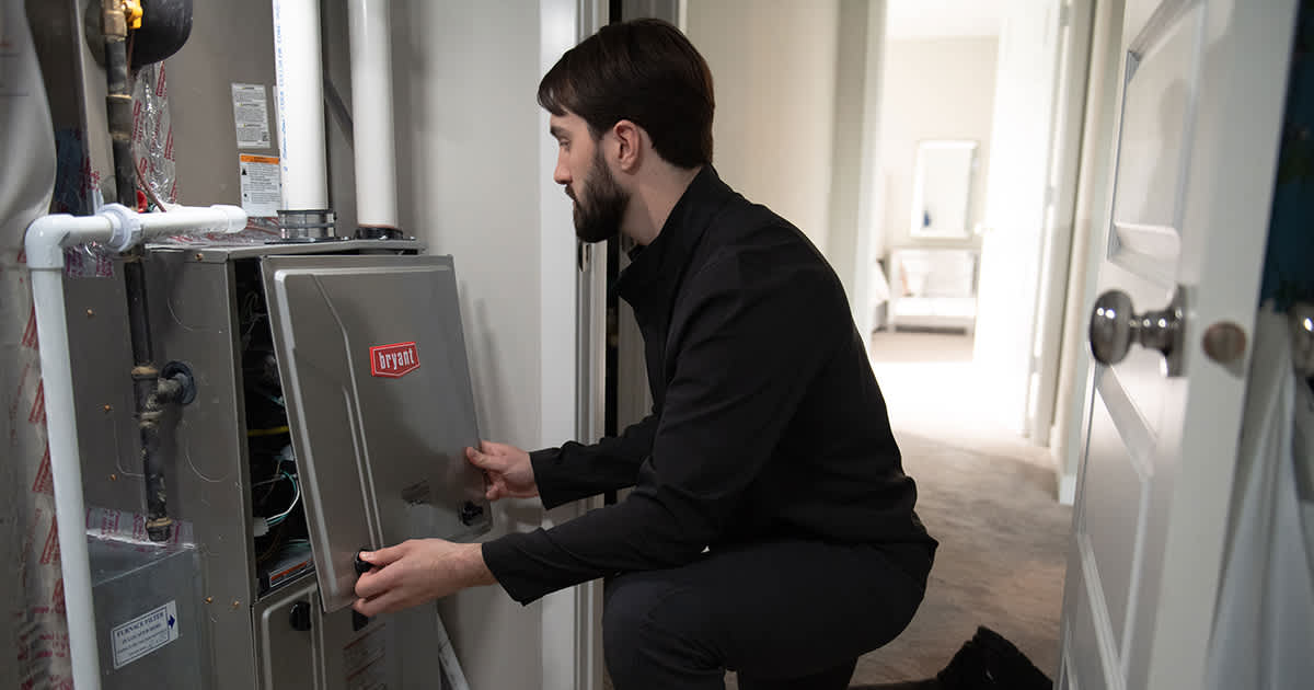 a bryant dealer finishes performing furnace inspection