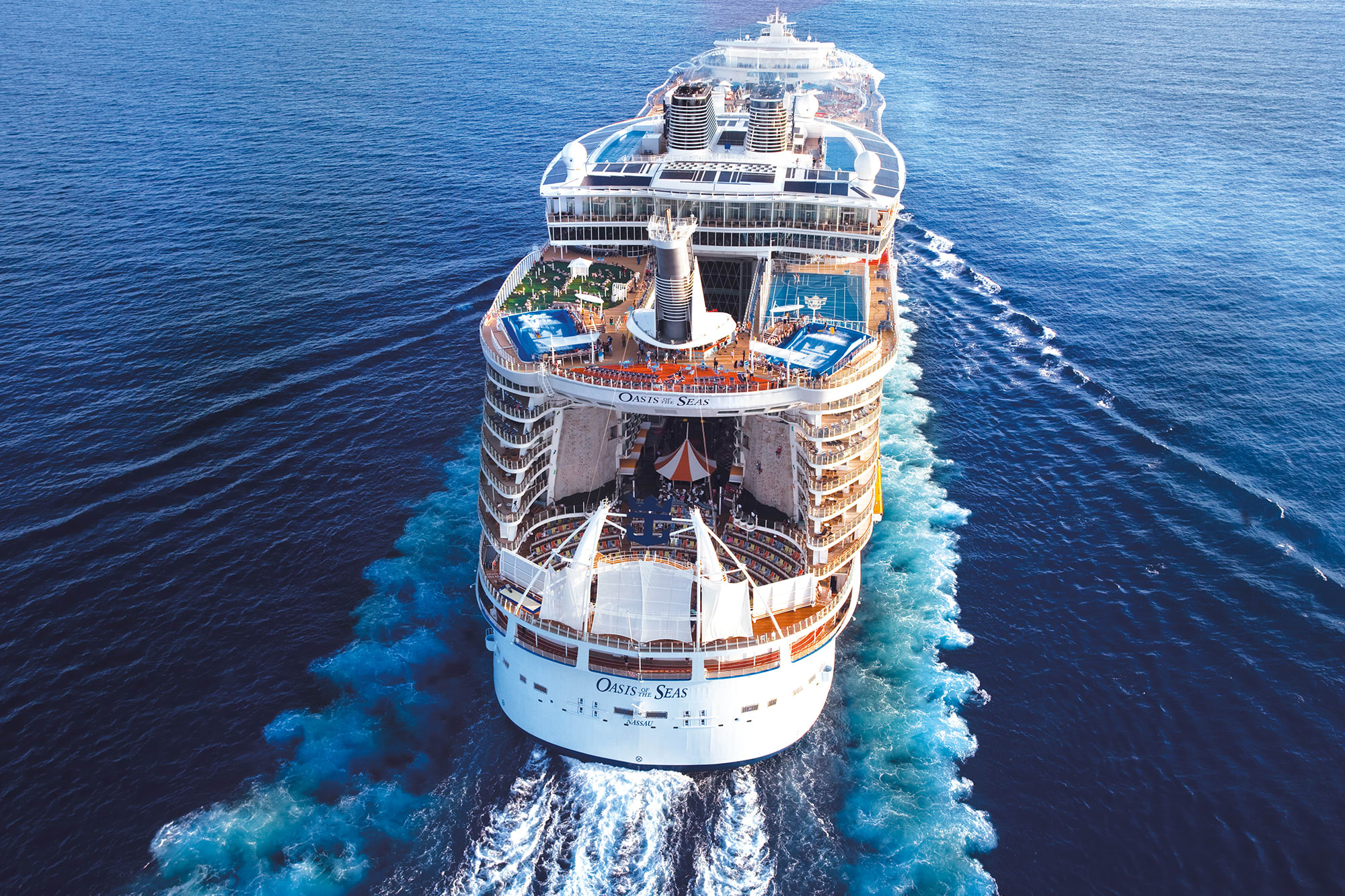 The stern of a sailing cruise ship, the Oasis of the Seas. The stern of a sailing cruise ship, the Oasis of the Seas.