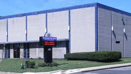 carrier-exterior-stone-building-with-signage-sm