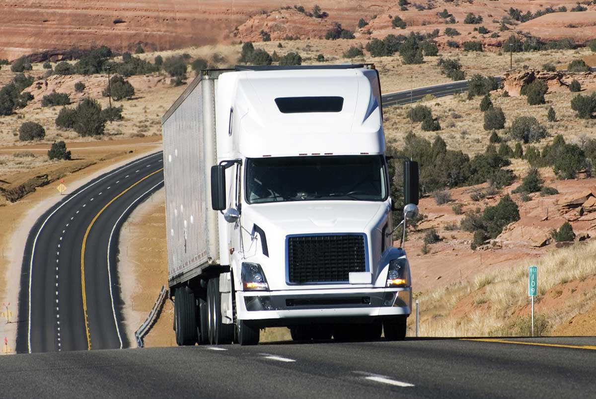 white-truck-desert-road