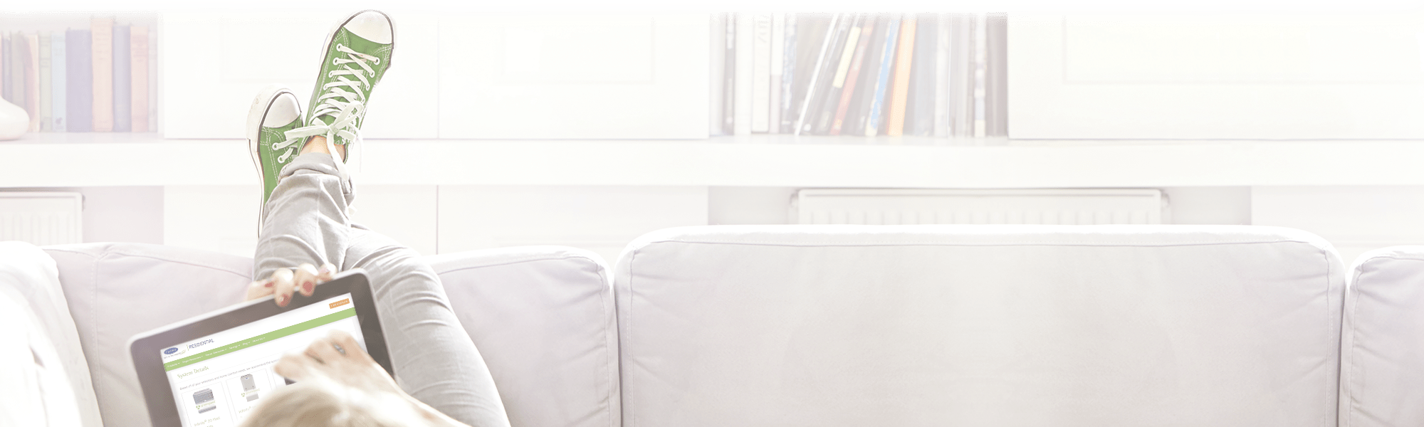 woman-with-ipad-finding-hvac-system-2000x600-system-details-transparent