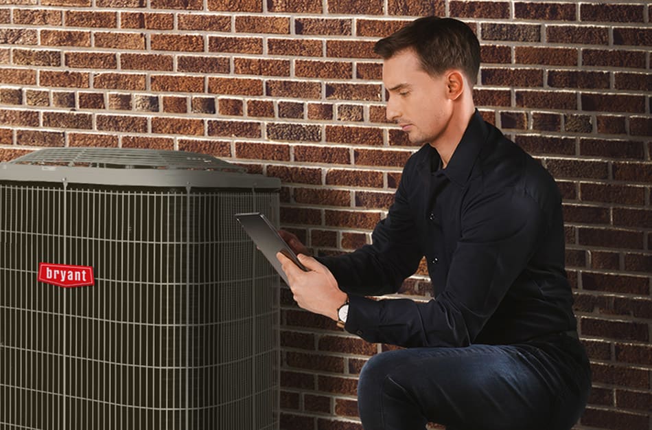 bryant-hvac-contractor-next-to-ac-unit