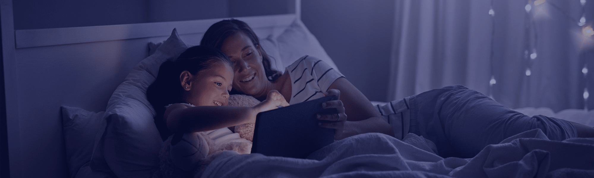 mother-and-child-in-bed-night-time
