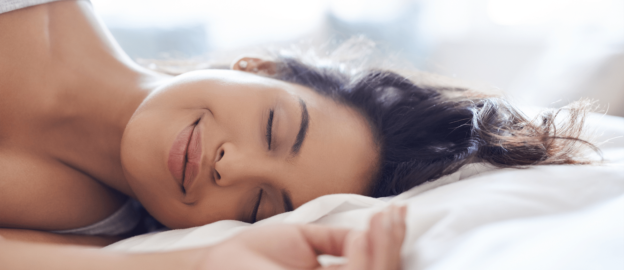 woman-enjoying-ultra-quiet-performance-while-sleeping