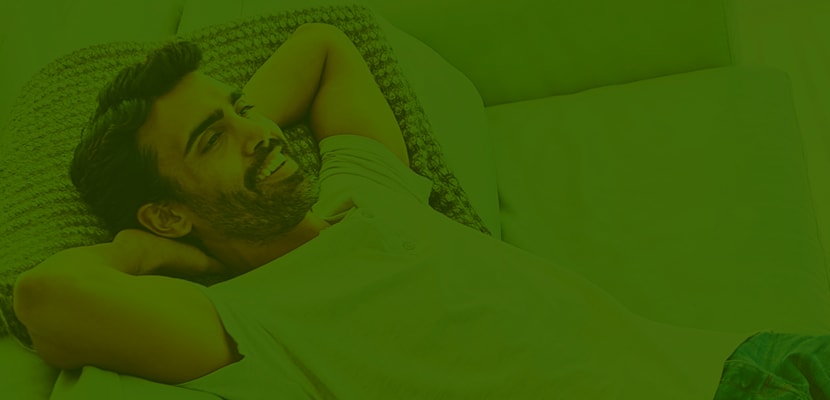 man-relaxing-with-infinity-air-purifier