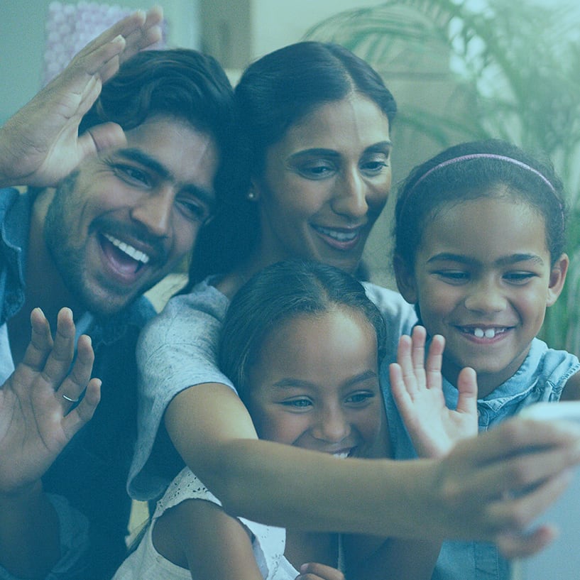 happy-family-looking-at-tablet-mb