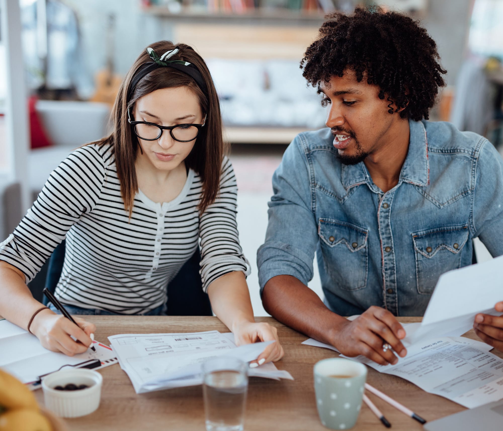 man and woman planning to save for carrier infinity systme