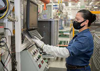 woman-factory-worker-covid-19-sm
