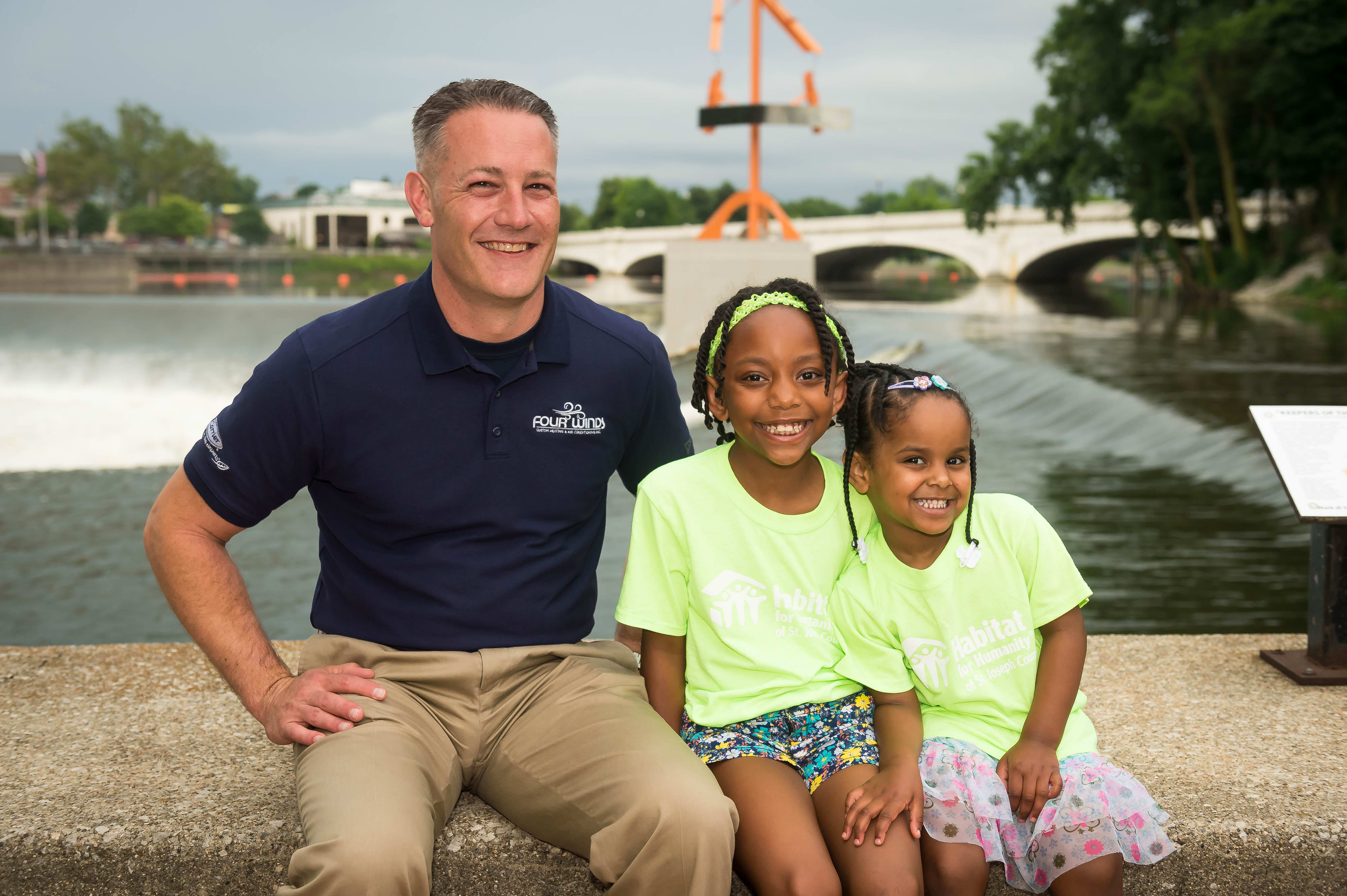 habitat-for-humanity-man-children-smiling