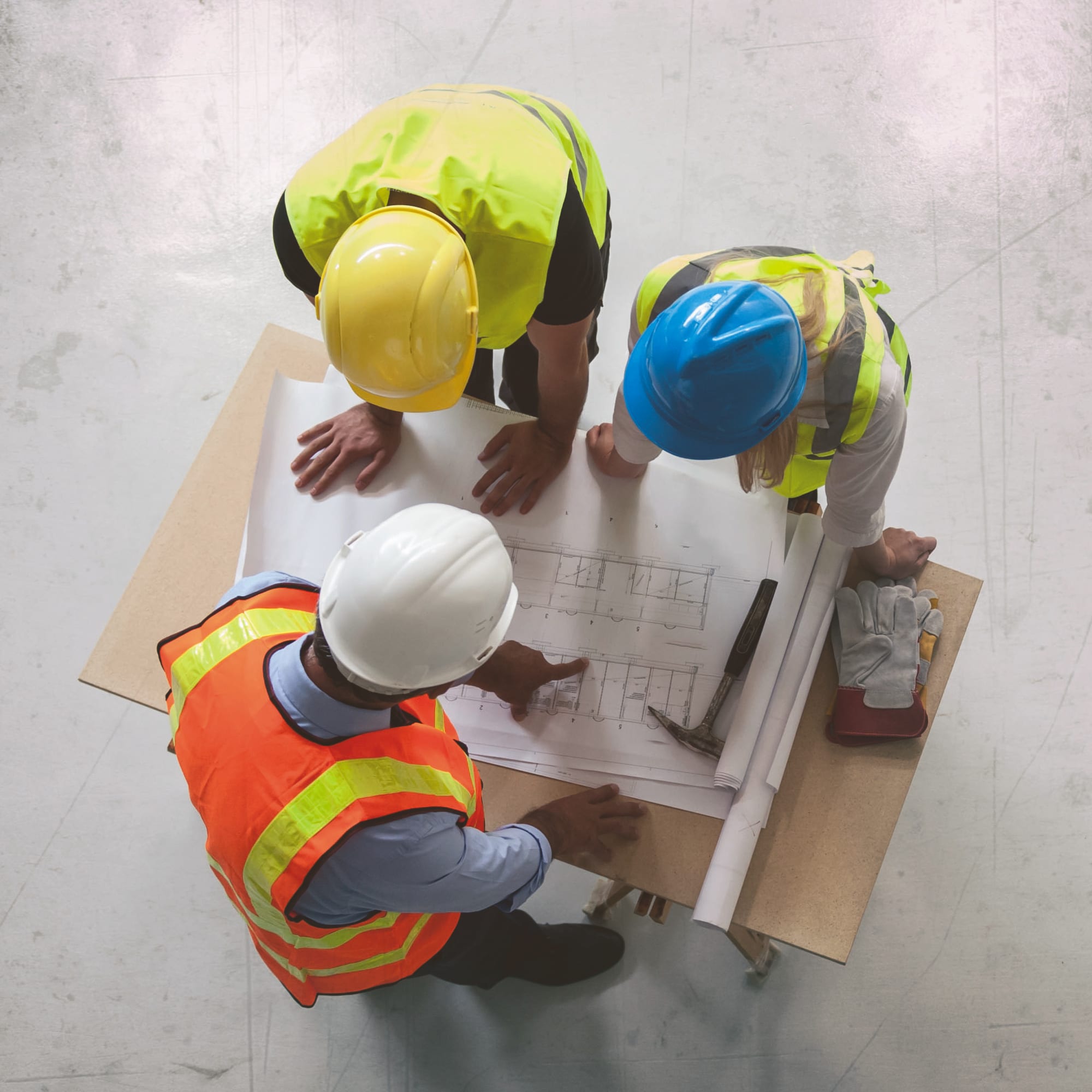 engineers-looking-at-blueprints_sq