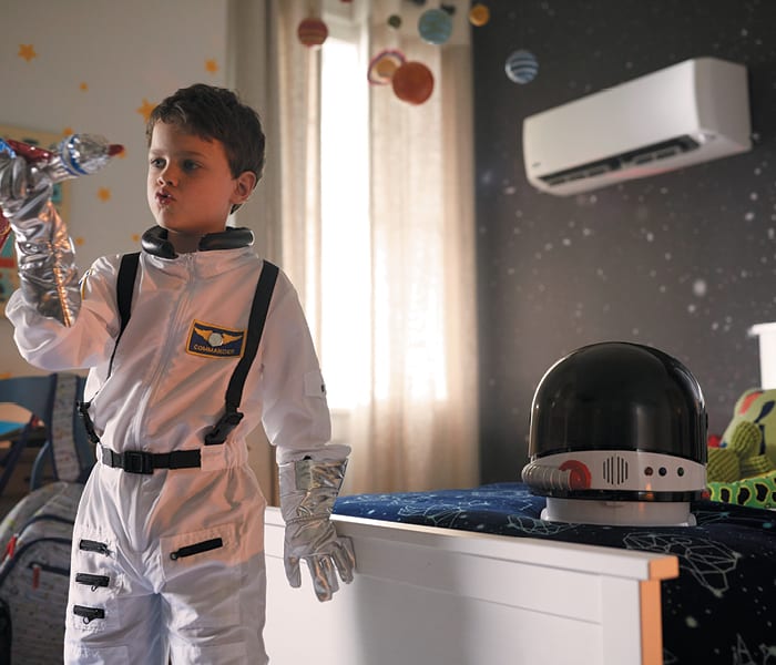 boy-in-space-suit-playing