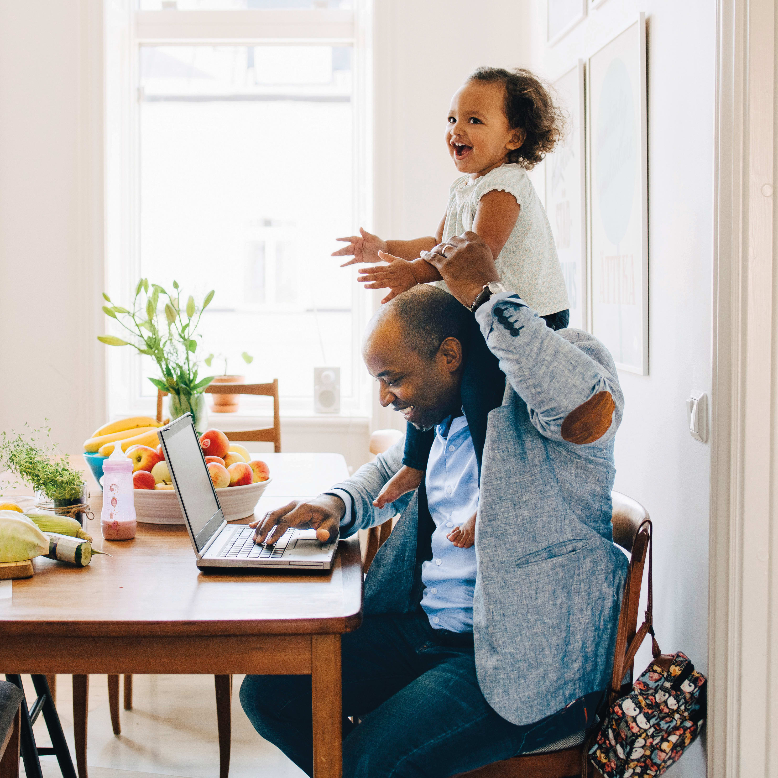 healthy-homes-man-sitting-at-table-with-daughter-1x1