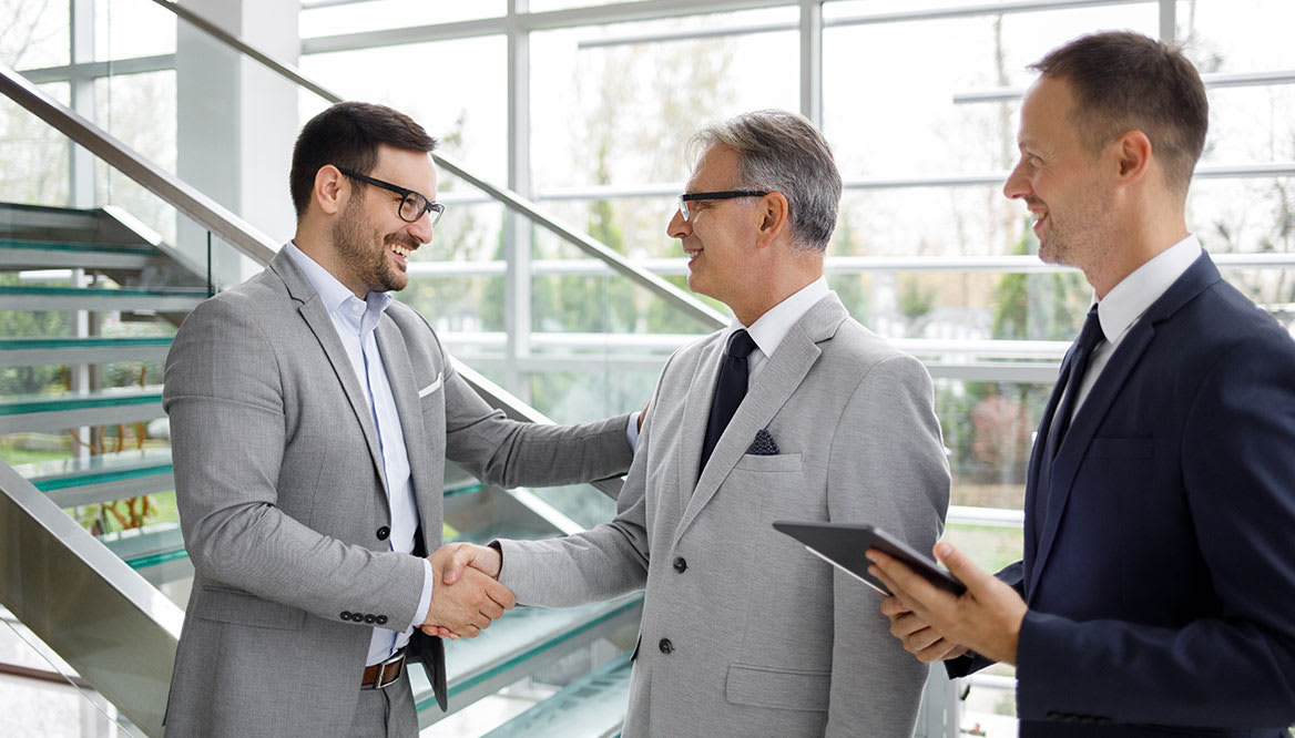 business-men-shaking-hands-1168x666