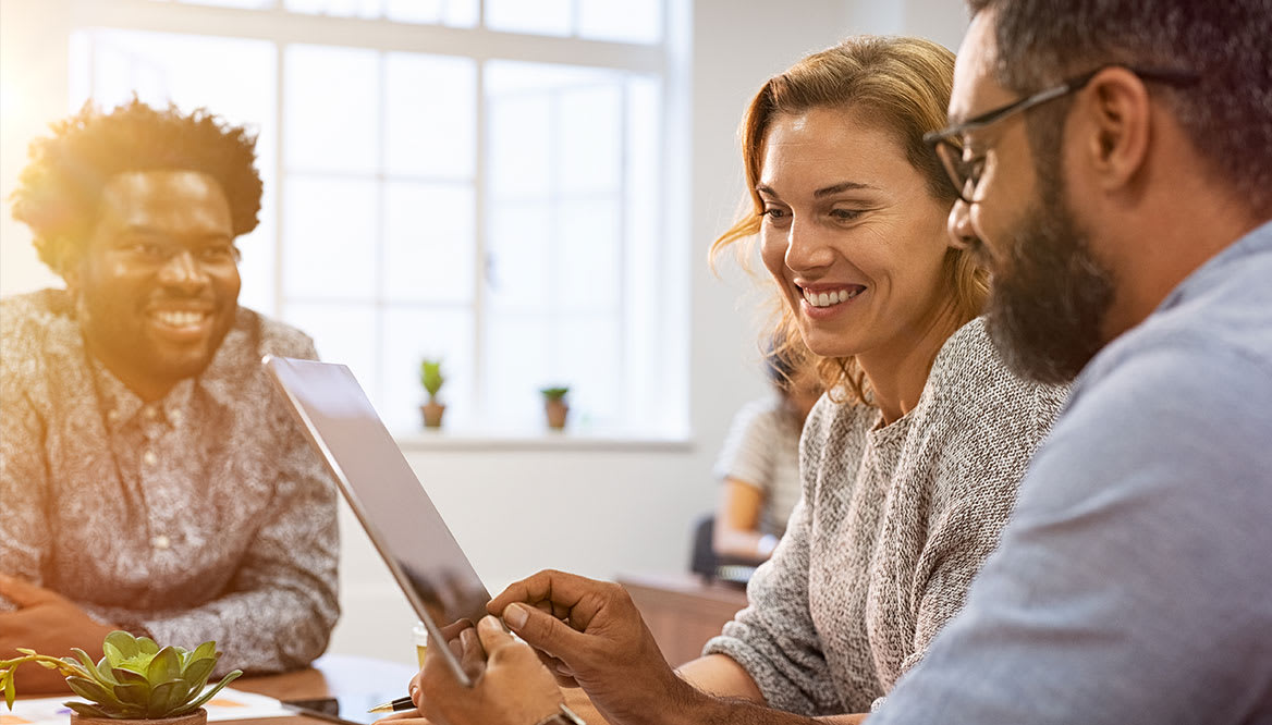 man-woman-looking-tablet