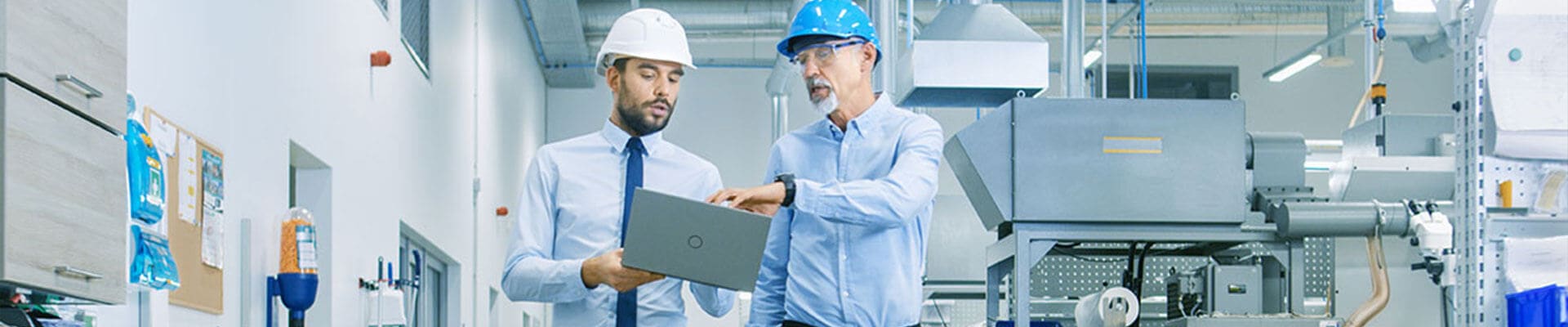 Two-Employees-are-discussing-with-laptop