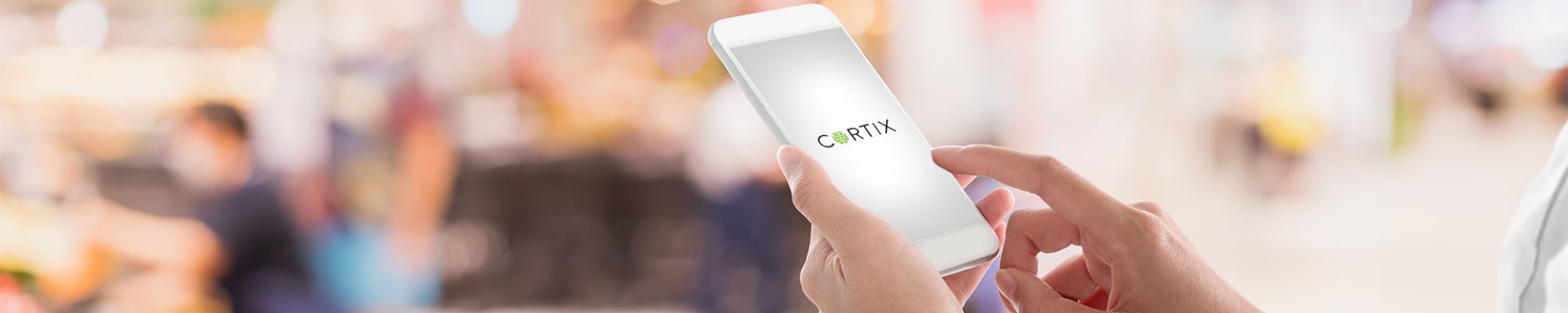 Girl-looking-at-CORTIX-app