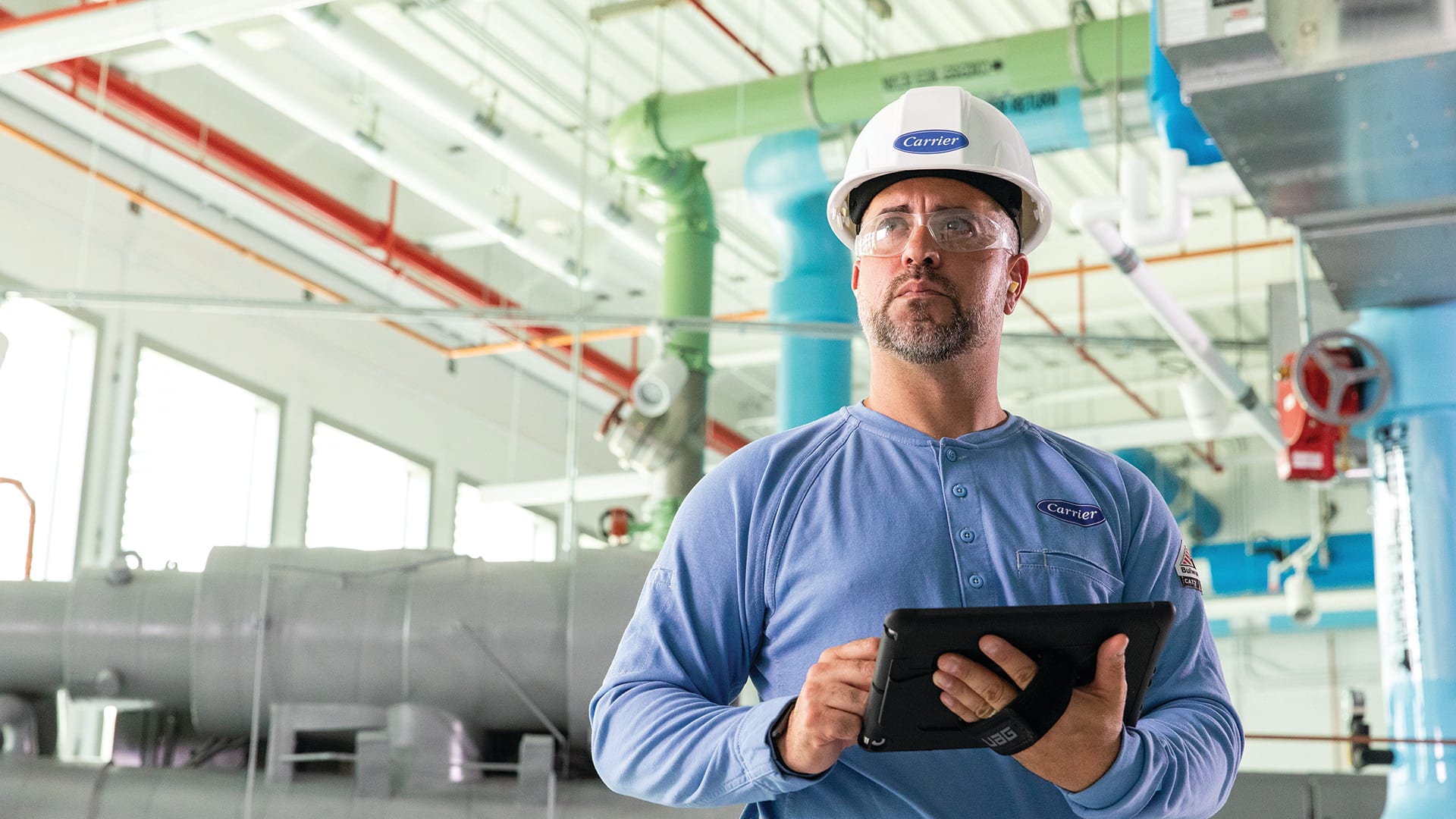 service-tech-on-tablet-in-mechanical-room