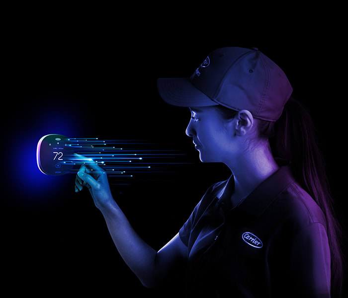 intelisense-dealer-touching-thermostat-premium-tools-smarter-connection