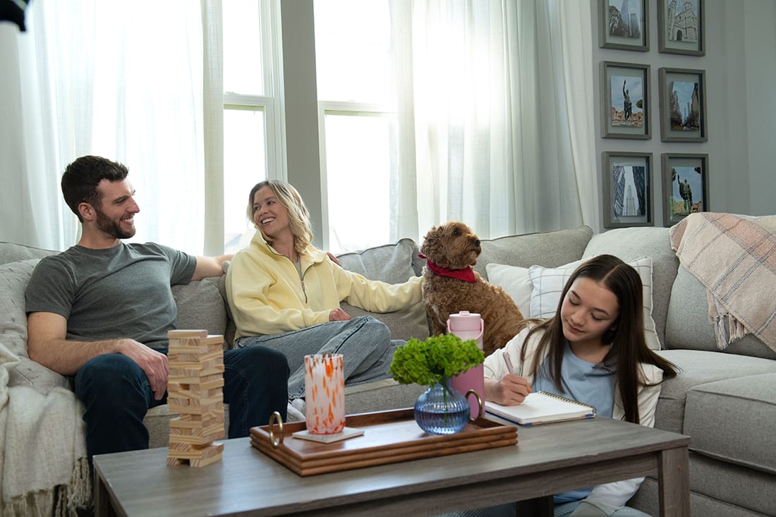 family-relaxes-in-home-after-air-filter-replacement