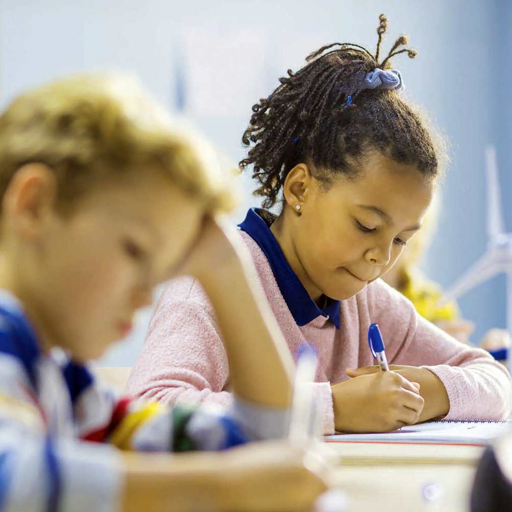 kids-in-classroom-working-1x1