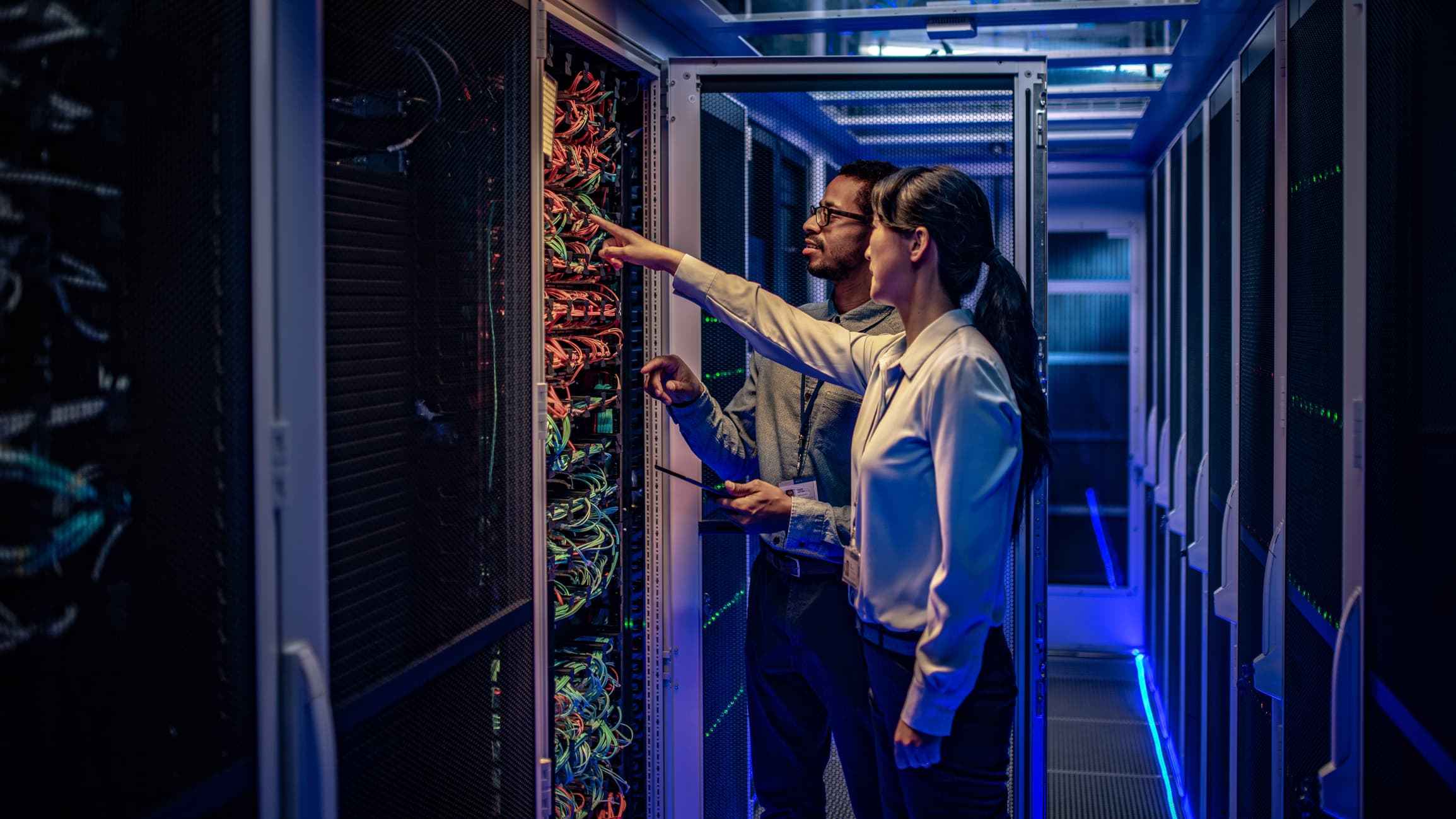 man-and-woman-in-a-data-center
