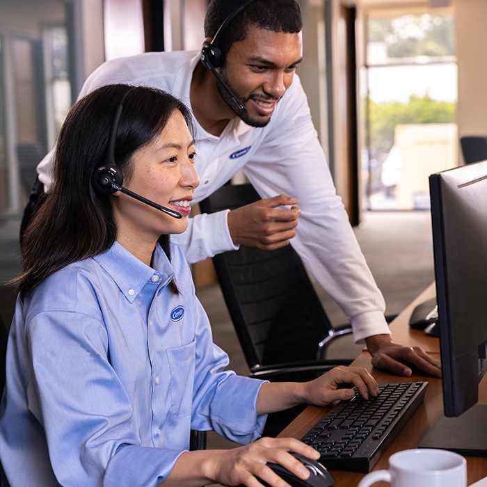 service-tech-next-to-van-16x9