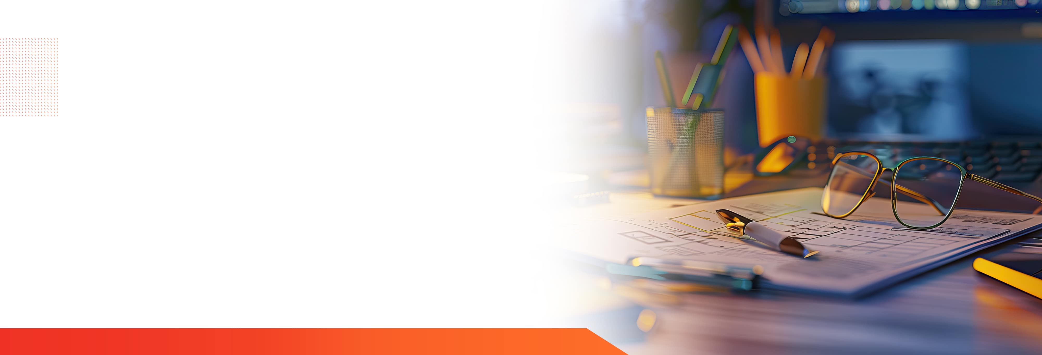 desktop-with-papers-and-computer-2000x400