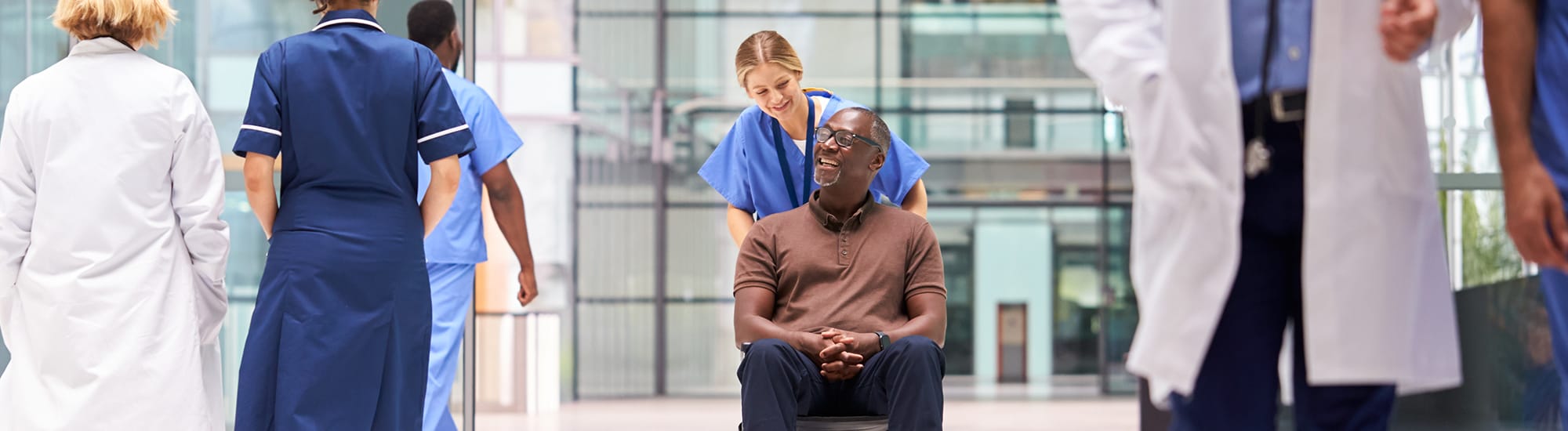 secure-hospital-entrance-people-2000x550