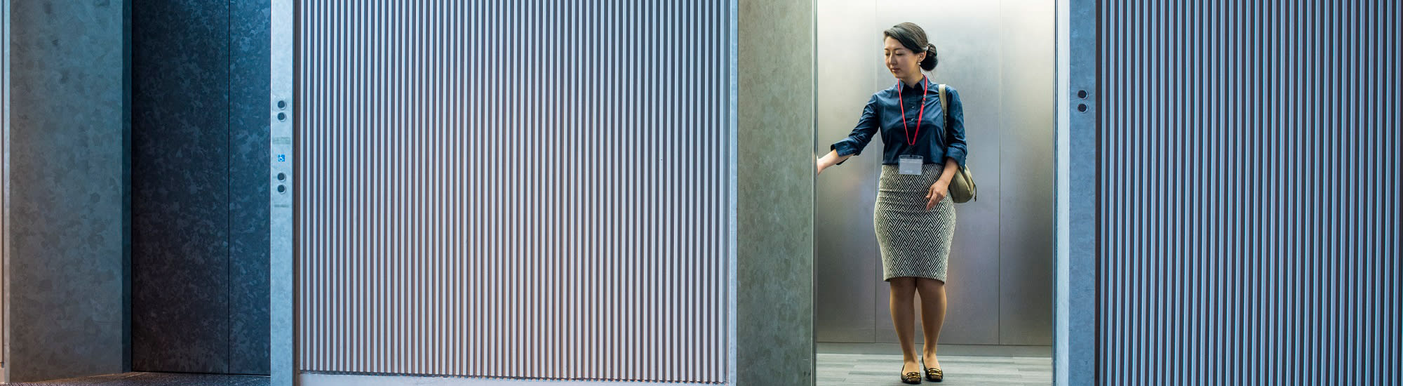 woman-in-elevator-2000x550