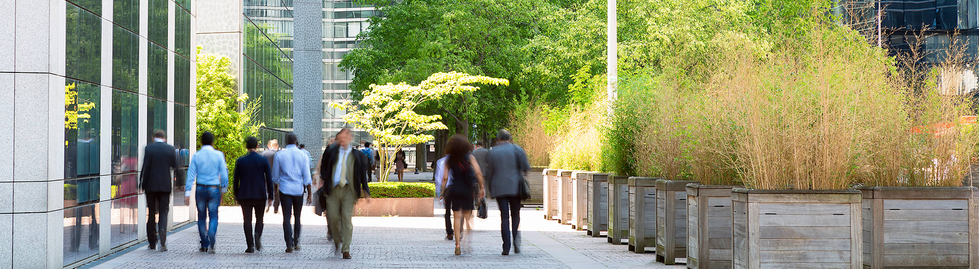 people-walking-in-modern-city-2000x550