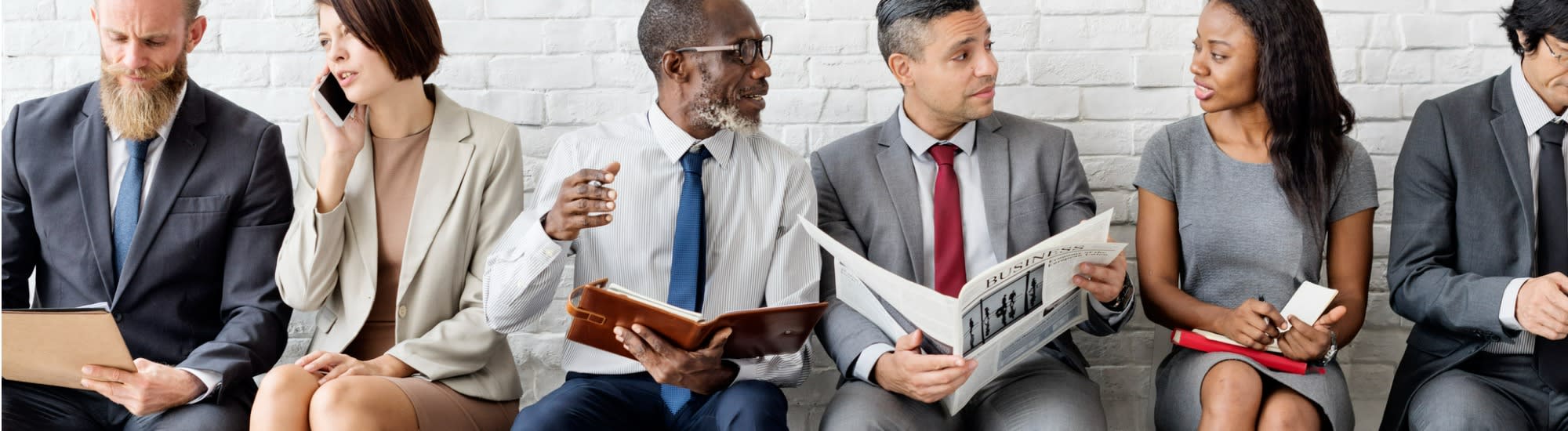 business-people-consuming-news-2000x550