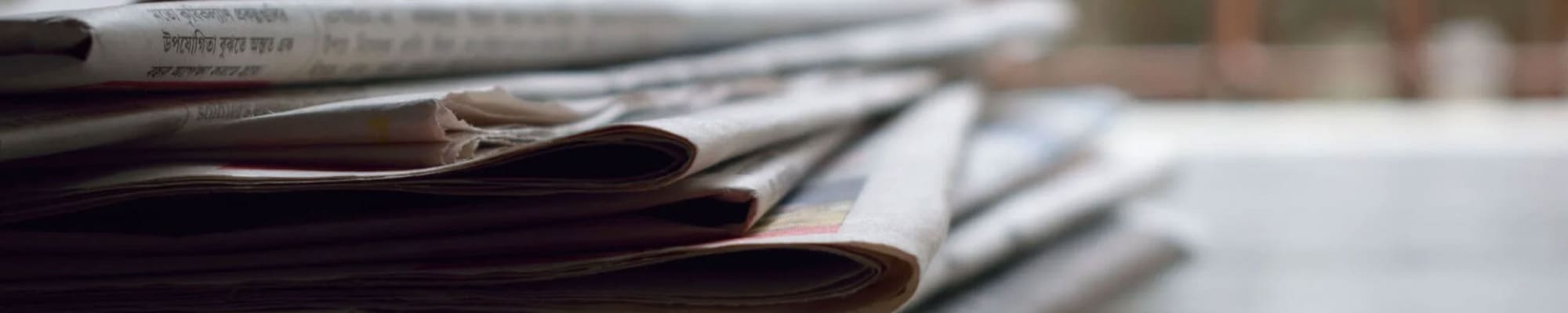 stack-of-newspapers