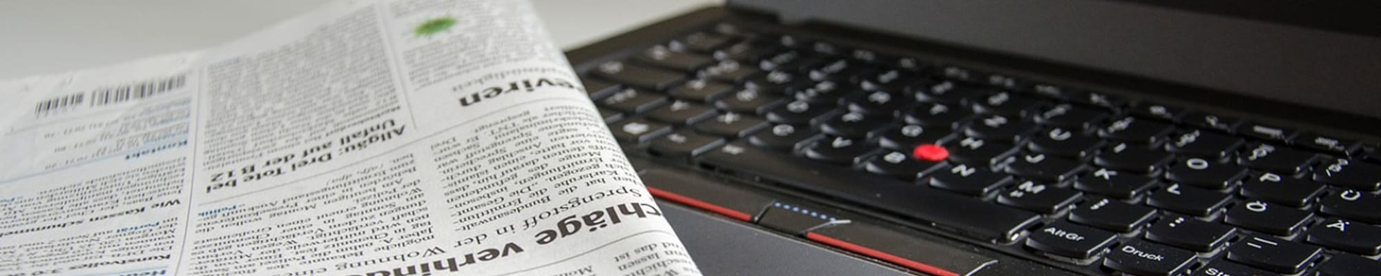 newspaper-and-laptop