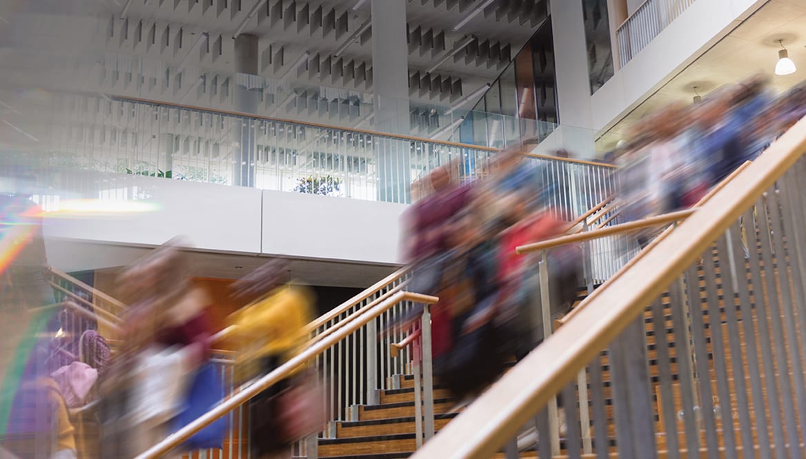 people-stairs-blurred-1168x666