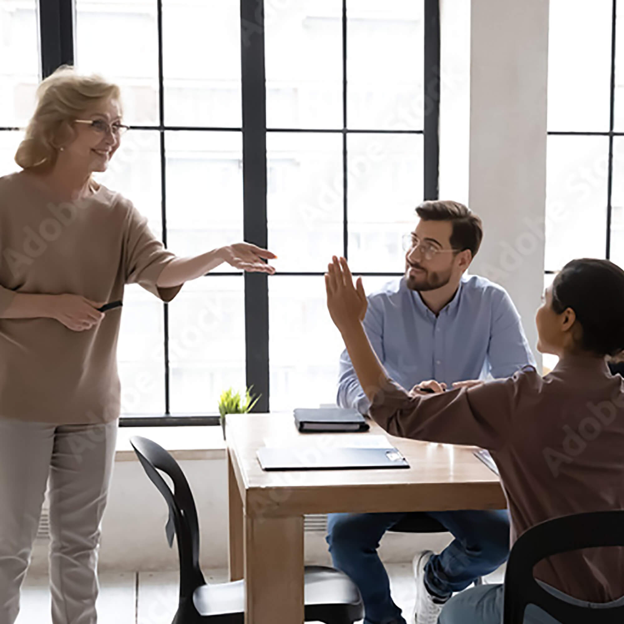 ciat-frequestly-asked-questions-woman-raising-hand-in-a-meeting-c