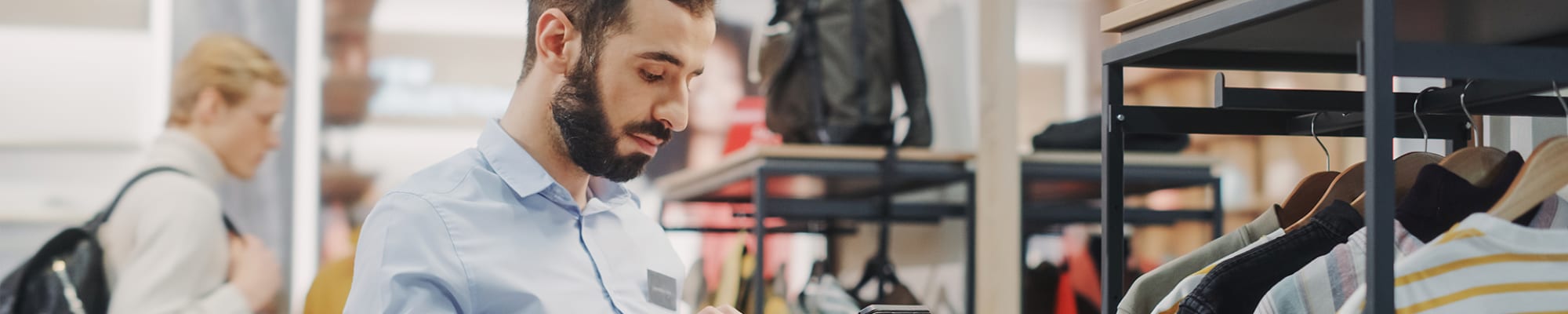 Man-Using-Tab-In-Store