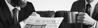 people-reading-newspaper-and-drinking-coffee-323x95